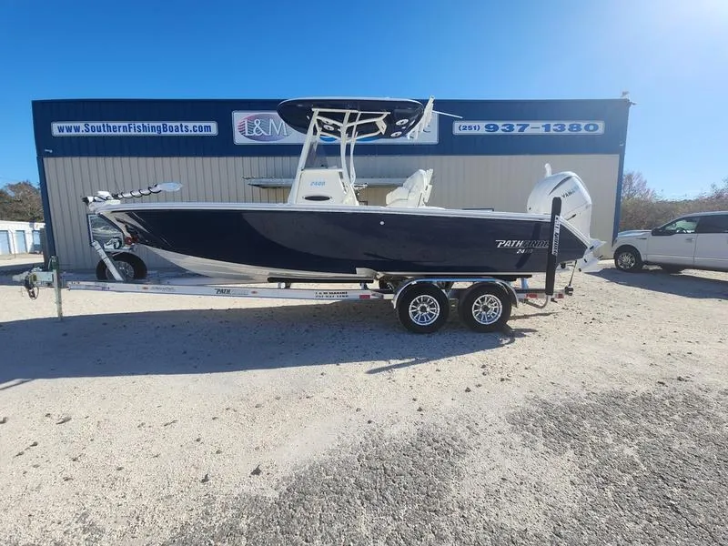 Slide: The Image of 2025 Pathfinder 2400 Open boat on trailer at Southern Fishing Boats dealership. - 26
