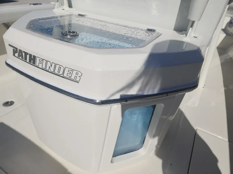 Slide: The Image of 2025 Pathfinder 2400 Open boat livewell with clear lid and logo. - 6