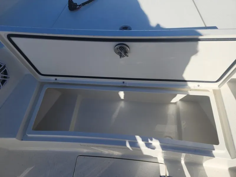 Slide: The Image of Open storage compartment on 2025 Pathfinder 2400 Open boat. - 7