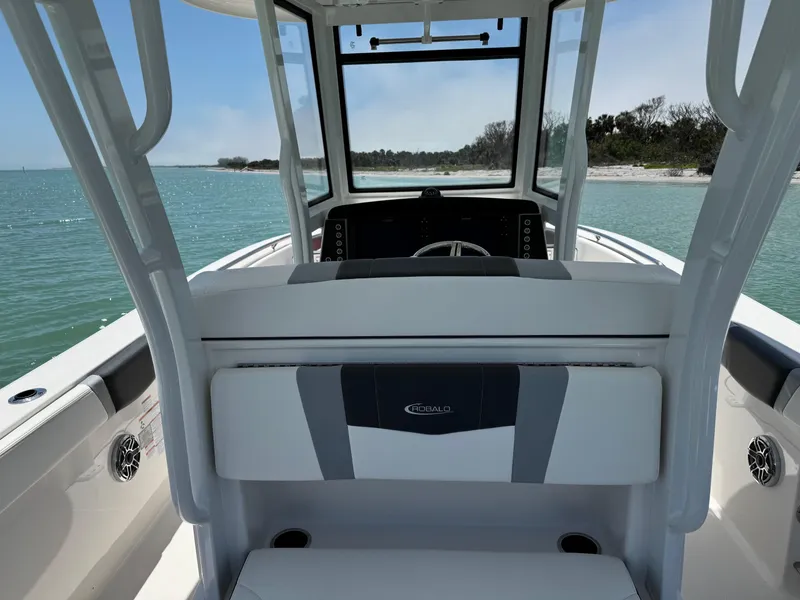 Slide: The Image of 2022 Robalo R272 Center Console boat interior with ocean view. - 7