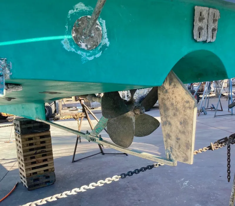 Slide: The Image of 2006 Mainship Pilot 30-II Sedan boat propeller and rudder detail. - 33