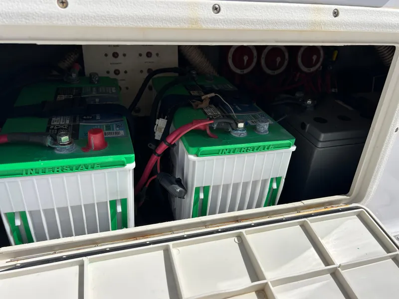 Slide: The Image of Battery compartment of a 1999 Pro-Line 2950 WALK boat with Interstate batteries. - 46