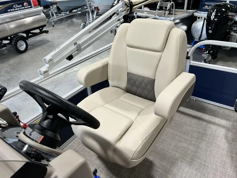 Slide: The Image of 2025 Sun Tracker Bass Buggy® 16 XL Select captain's chair in a boat interior. - 10