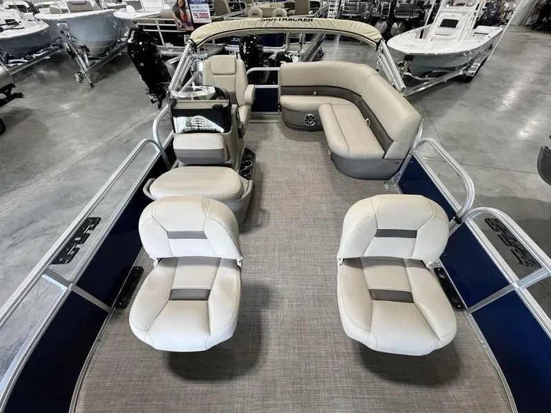 Slide: The Image of 2025 Sun Tracker Bass Buggy® 16 XL Select pontoon boat with spacious seating and modern design. - 17