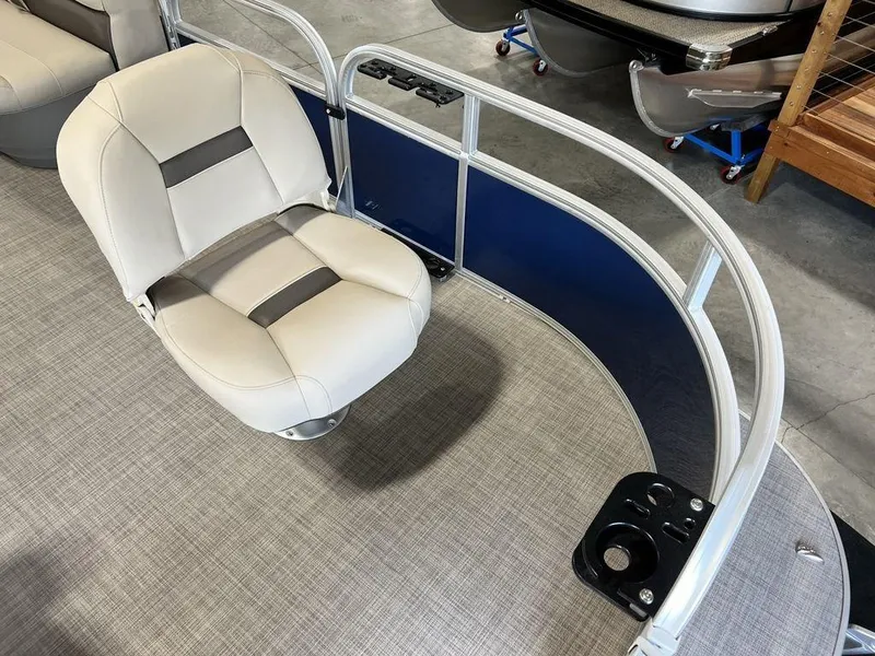Slide: The Image of 2025 Sun Tracker Bass Buggy® 16 XL Select boat seat with gray upholstery and blue paneling. - 4