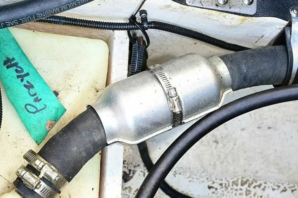 Slide: The Image of Boat exhaust system with metal clamp on Crownline 236 SC, 2015 model. - 27