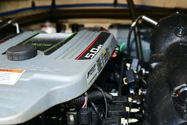 Slide: The Image of Engine of 2015 Crownline 236 SC boat, featuring a 5.0 MPI MerCruiser. - 28