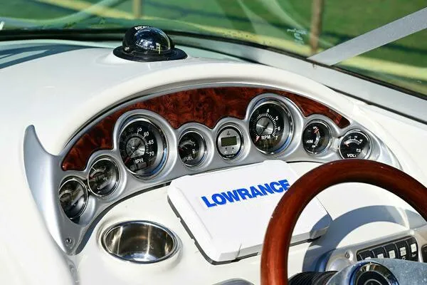 Slide: The Image of Dashboard of 2015 Crownline 236 SC boat with gauges and Lowrance device. - 35