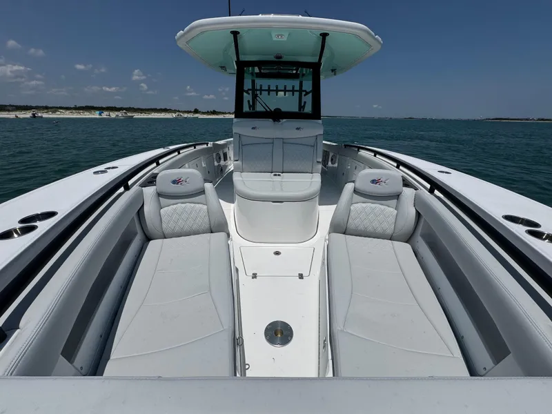Slide: The Image of 2025 Crevalle 33 CSF boat with spacious seating on open water. - 15