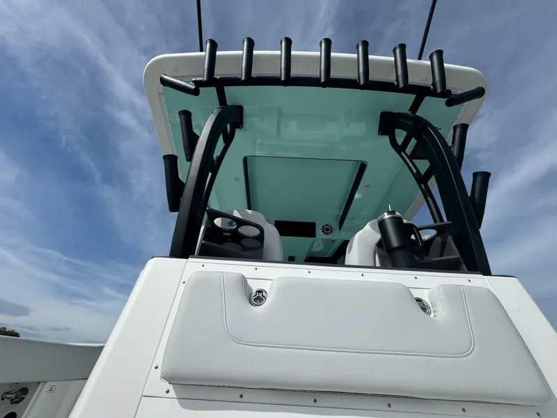 Slide: The Image of 2025 Crevalle 33 CSF boat with sleek design and modern features, viewed from below. - 31