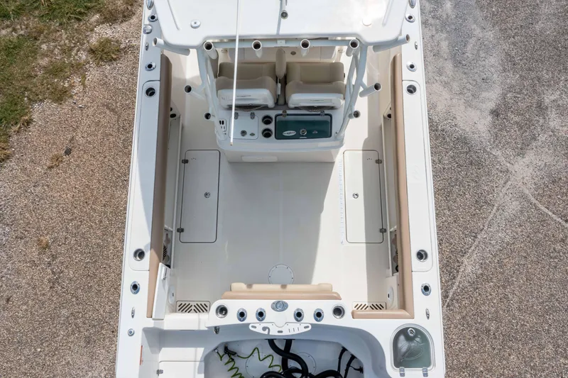 Slide: The Image of 2018 Sailfish 290 CC boat interior, aerial view showing seating and deck layout. - 20