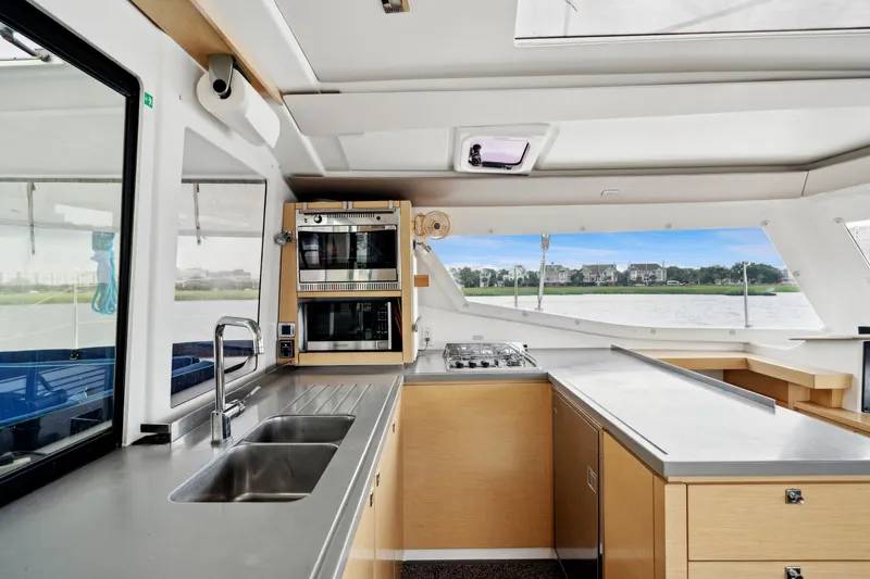 Slide: The Image of Modern kitchen interior of 2014 Fountaine Pajot Helia 44 catamaran with stainless steel appliances. - 37