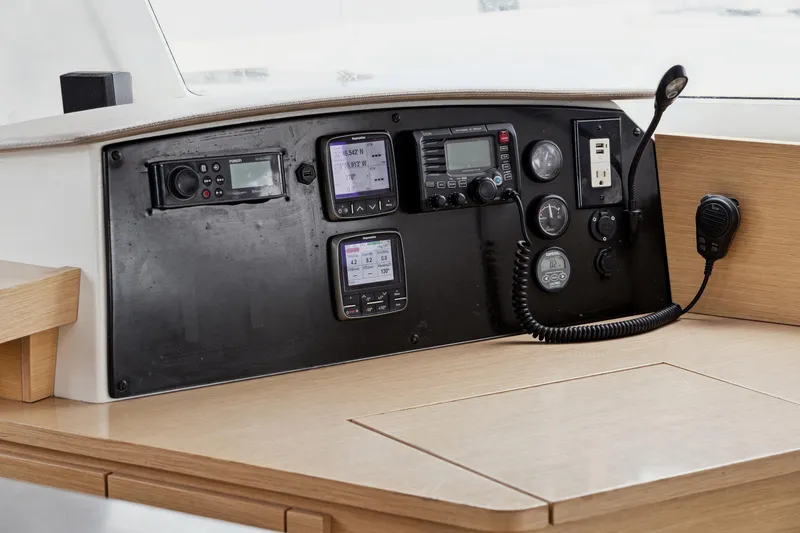 Slide: The Image of Control panel of 2014 Fountaine Pajot Helia 44 catamaran with navigation instruments. - 45