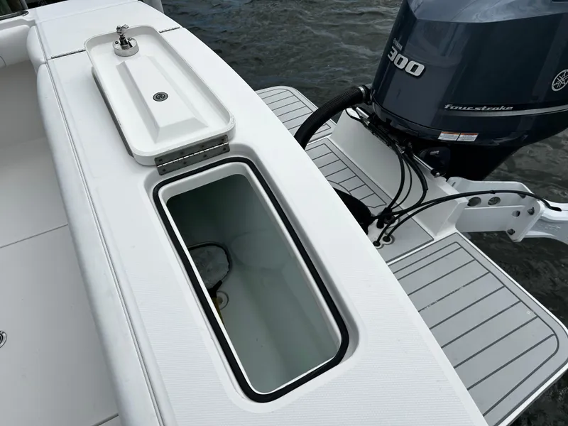 Slide: The Image of 2018 Regulator 23 Forward Seating boat with Yamaha 300 outboard motor. - 12