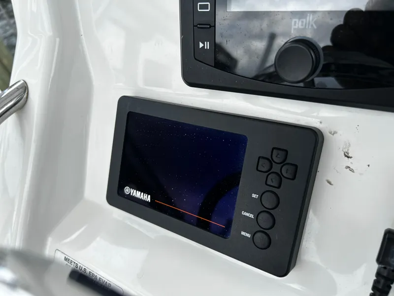 Slide: The Image of Yamaha control panel on 2018 Regulator 23 Forward Seating boat dashboard. - 14