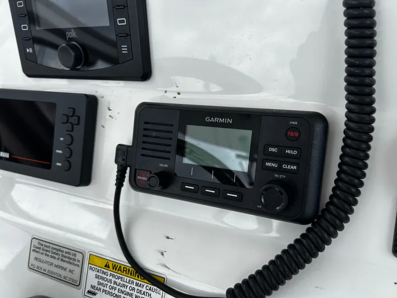 Slide: The Image of Garmin marine radio on 2018 Regulator 23 Forward Seating boat dashboard. - 23