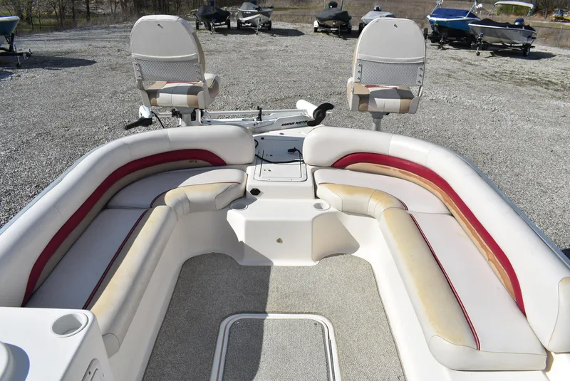 Slide: The Image of 2006 Hurricane FunDeck 228 RE boat interior with spacious seating and fishing chairs. - 12
