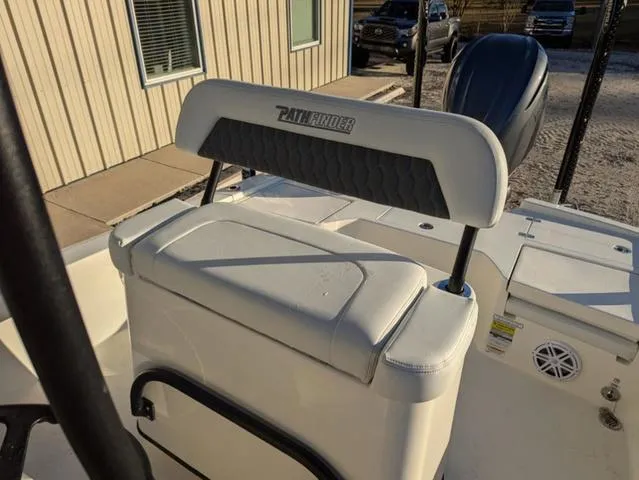 Slide: The Image of 2025 Pathfinder 2500 Hybrid boat seat and console in outdoor setting. - 17