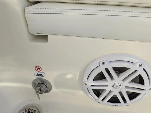 Slide: The Image of Interior of 2025 Pathfinder 2500 Hybrid boat with speaker and raw water access. - 25