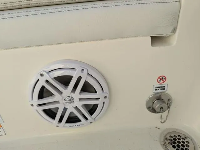 Slide: The Image of Speaker and fresh water outlet on 2025 Pathfinder 2500 Hybrid boat. - 26