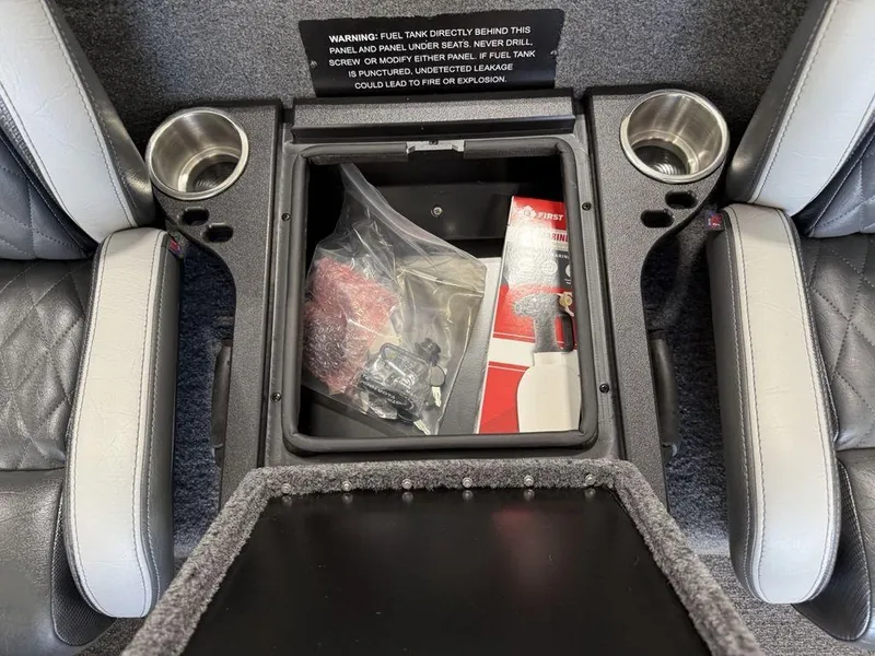Slide: The Image of Center console of 2025 Phoenix 721 ZXL with storage and cup holders. - 17