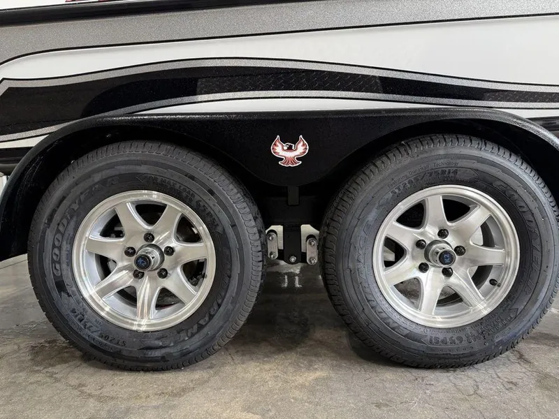 Slide: The Image of 2025 Phoenix 721 ZXL trailer with dual wheels and sleek design. - 4