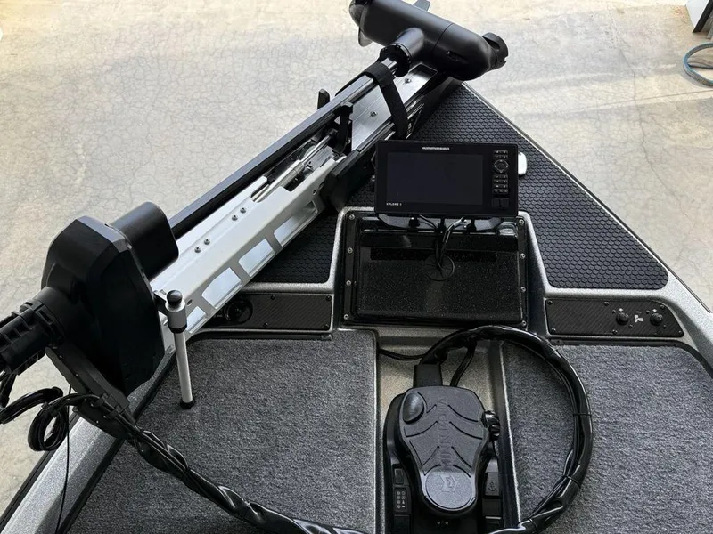 Slide: The Image of 2025 Phoenix 721 ZXL boat deck with trolling motor and navigation system. - 6