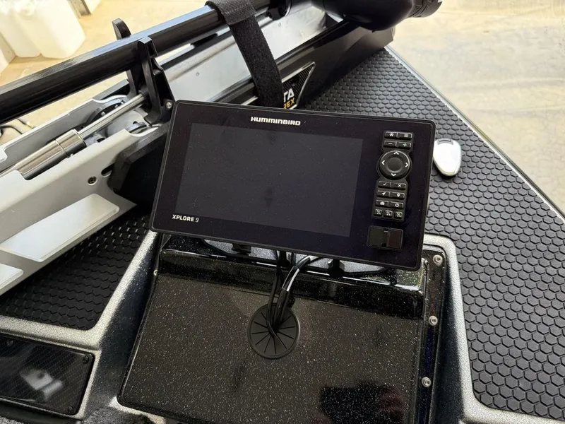 Slide: The Image of 2025 Phoenix 721 ZXL boat with Humminbird Xplore 9 fishfinder on deck. - 7