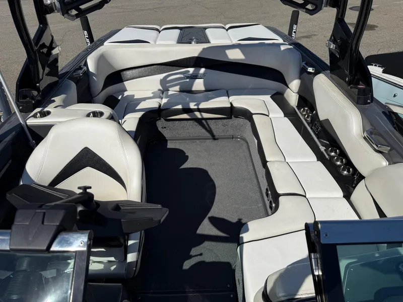 Slide: The Image of 2014 Supra Launch SC350-550 boat interior with white and black seating. - 14