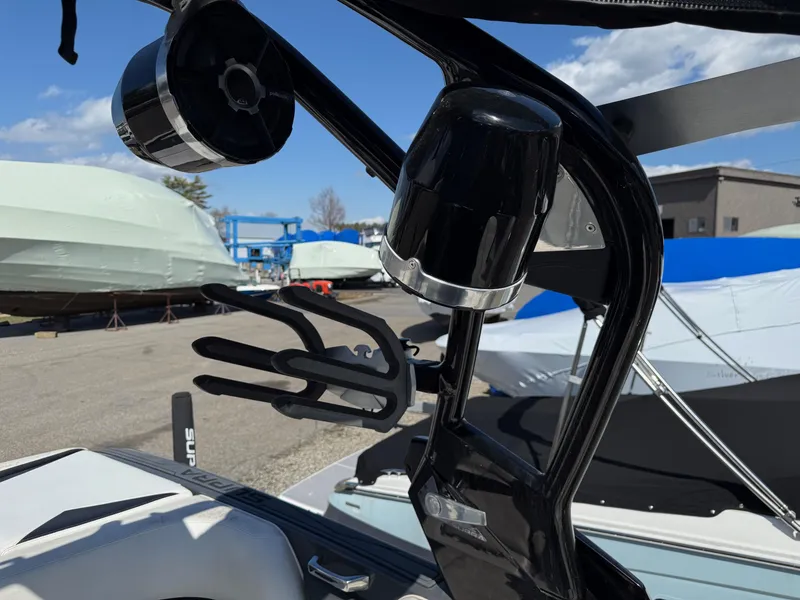 Slide: The Image of 2014 Supra Launch SC350-550 boat with black wakeboard tower and speakers. - 8
