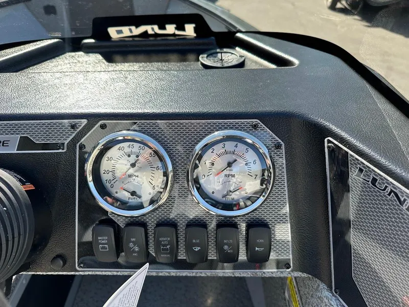 Slide: The Image of Dashboard of 2025 Lund 1675 Adventure SS boat with gauges and controls. - 17