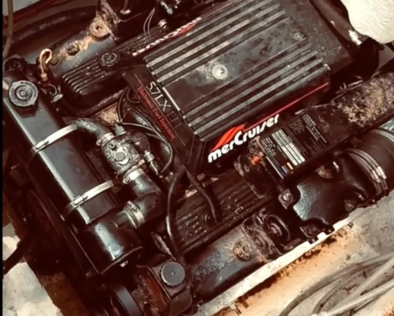 Slide: The Image of 1998 Maxum 2700 SCR boat engine, featuring a MerCruiser 5.7L V8 motor. - 15