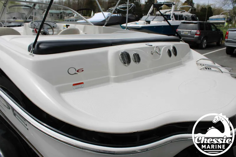 Slide: The Image of 2007 Tahoe Q6 boat in a marina, featuring sleek design and Chessie Marine logo. - 8