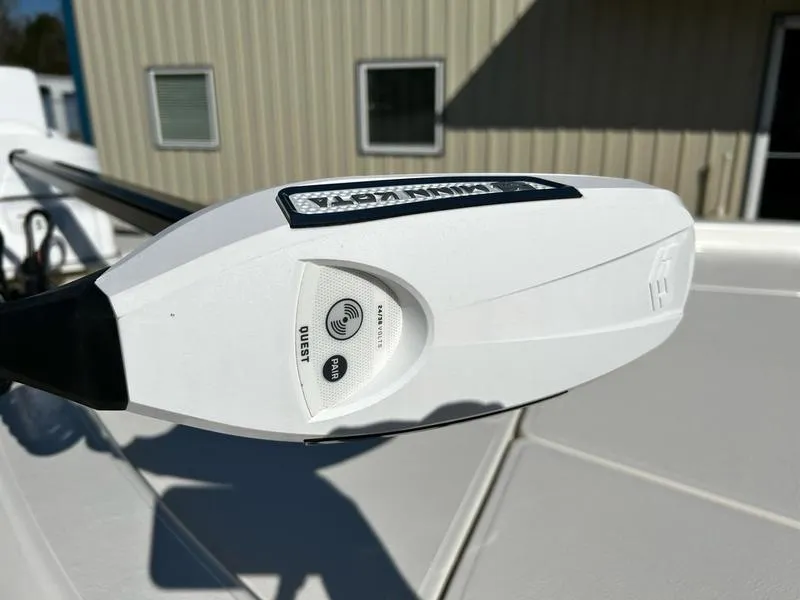 Slide: The Image of Close-up of a 2025 Skeeter SX221 boat trolling motor control panel. - 9