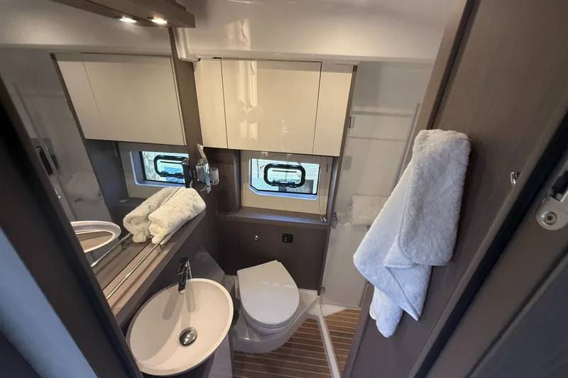 Slide: The Image of Modern bathroom in 2023 Beneteau Gran Turismo 45 yacht, featuring sleek design and amenities. - 21