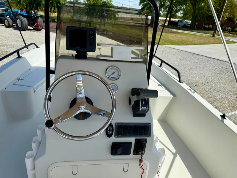Slide: The Image of 2015 Stott Craft SCV 2160 Bay boat console with steering wheel and gauges. - 25