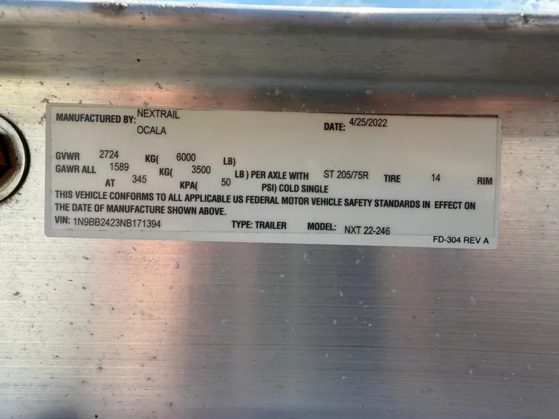 Slide: The Image of Label on a Nextrail trailer, model NXT 22-246, manufactured in Ocala, dated 4/25/2022. - 33