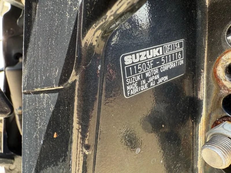 Slide: The Image of Label on Suzuki motor, model DF115A, made in Japan, attached to Stott Craft SCV 2160 Bay. - 34
