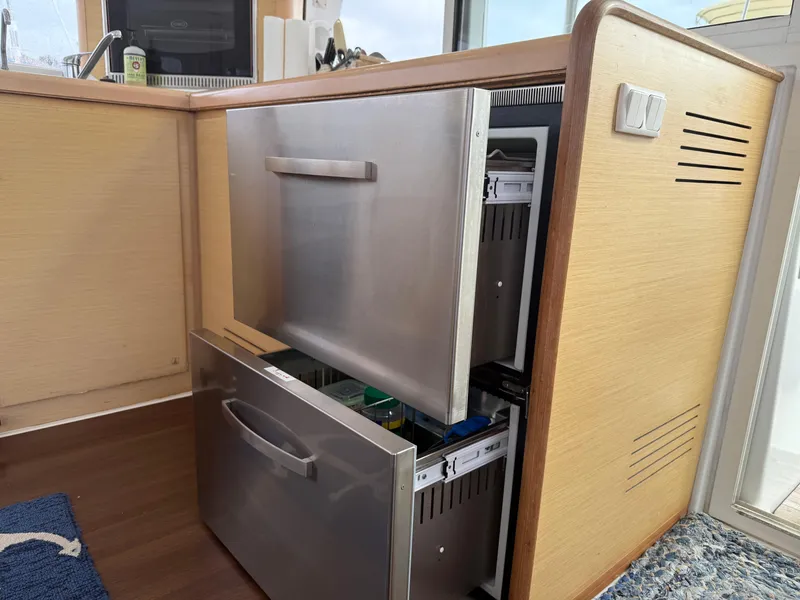 Slide: The Image of Stainless steel drawers in Lagoon 400 yacht's kitchen, 2010 model, open to reveal storage. - 23
