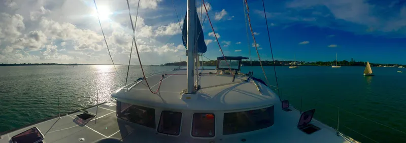 Slide: The Image of Lagoon 400 catamaran sailing on sunny waters, 2010 model with new engines. - 34