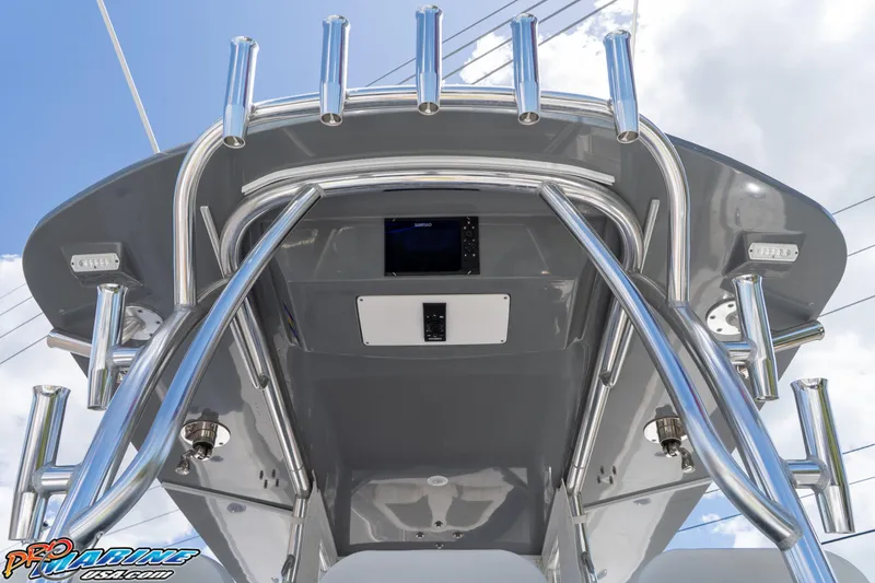 Slide: The Image of 2023 Front Runner 36 Center Console boat with sleek metal framework and modern design. - 11