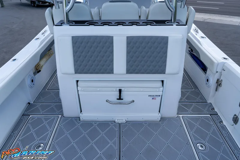 Slide: The Image of 2023 Front Runner 36 Center Console boat interior with storage and seating. - 22