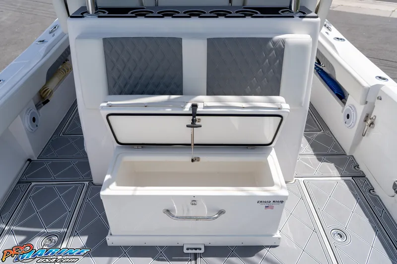 Slide: The Image of 2023 Front Runner 36 Center Console boat interior with open storage compartment. - 24