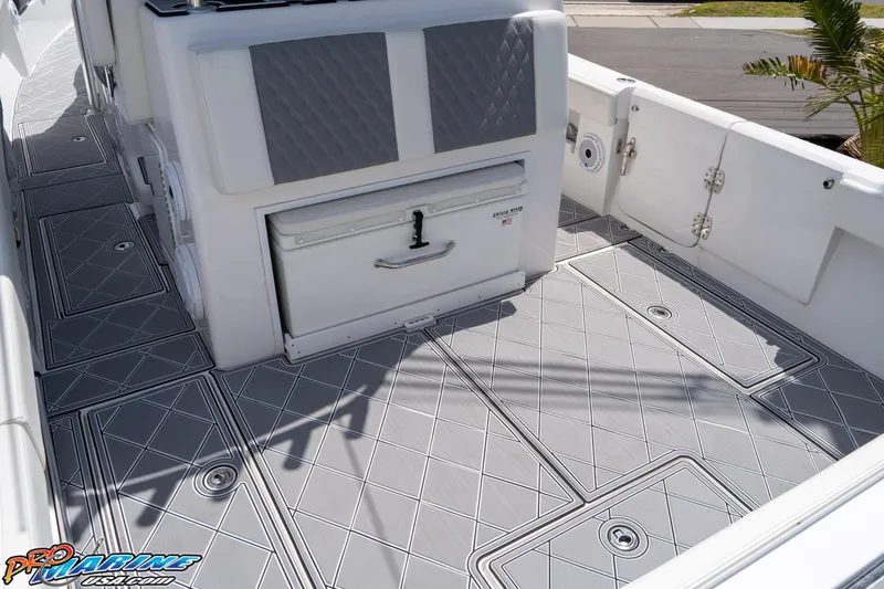 Slide: The Image of 2023 Front Runner 36 Center Console boat deck with storage and seating. - 25