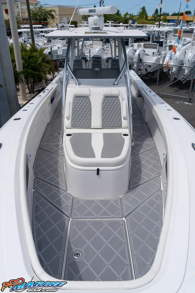 Slide: The Image of 2023 Front Runner 36 Center Console boat with sleek design and spacious deck. - 8
