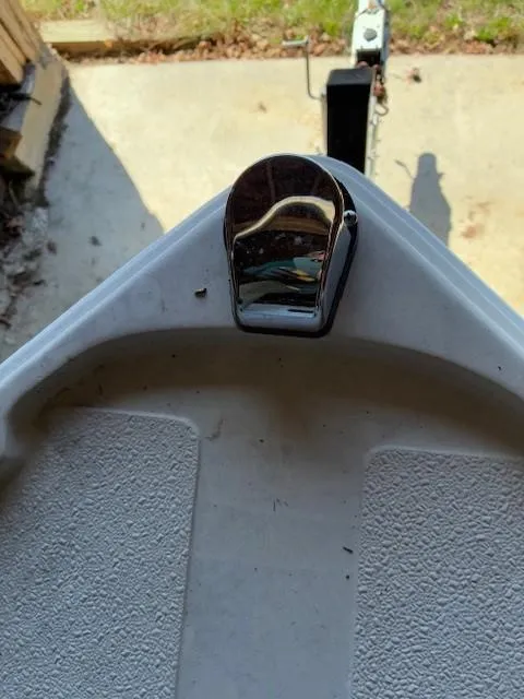 Slide: The Image of Bow of a 1990 Custom North End Composites Point boat with a metal cleat. - 10