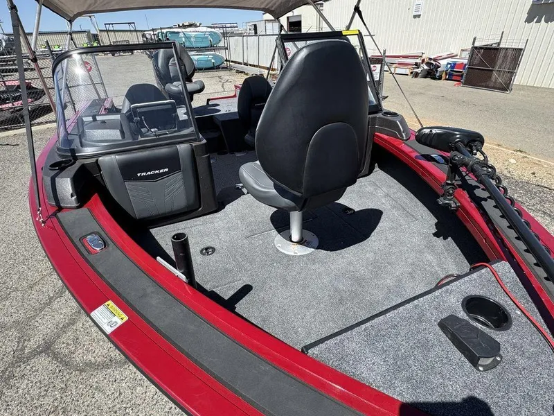 Slide: The Image of 2024 Tracker Targa™ V-18 Combo boat interior with seating and control panel. - 17