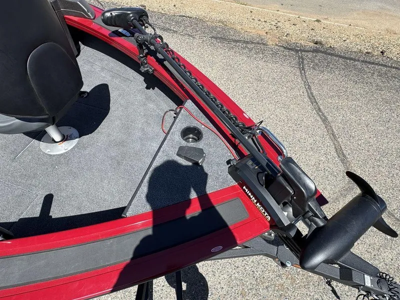 Slide: The Image of 2024 Tracker Targa™ V-18 Combo boat with trolling motor on red deck. - 19