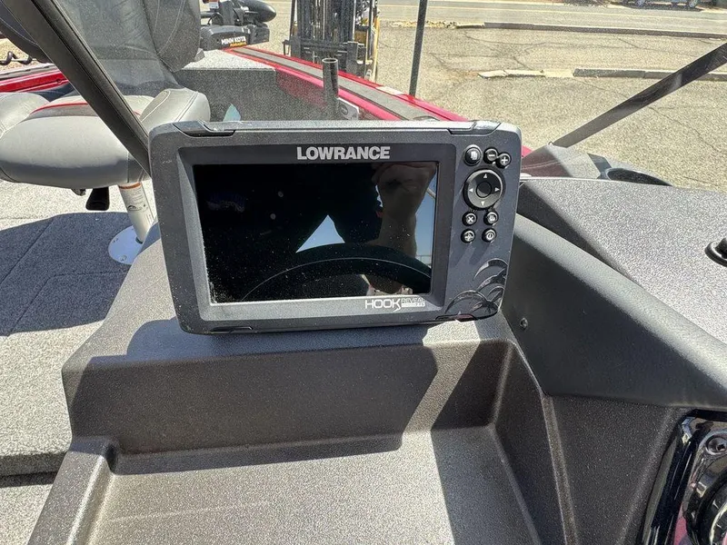 Slide: The Image of 2024 Tracker Targa™ V-18 Combo with Lowrance Hook fish finder on dashboard. - 24