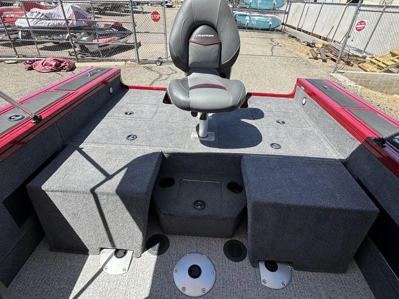 Slide: The Image of 2024 Tracker Targa™ V-18 Combo boat interior with seating and storage compartments. - 30